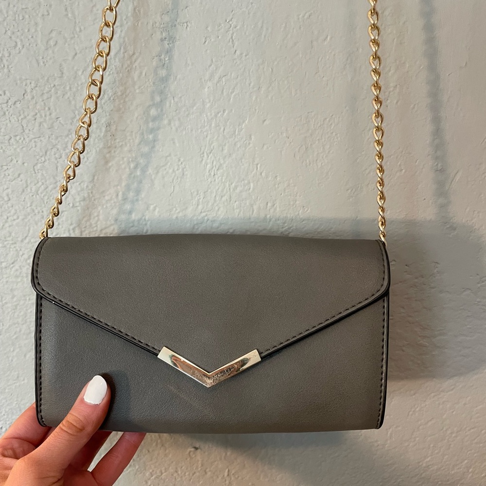 Gray clutch with gold accent/chain